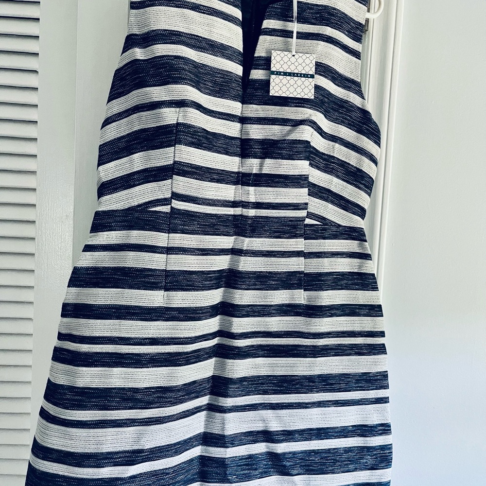 Pim + Larkin NWT Size Large, fully lined. Hits right above the knee.